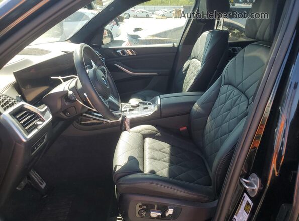 5UX23EM08S9W58217 2025 BMW X7 Черный Вид салона спереди
