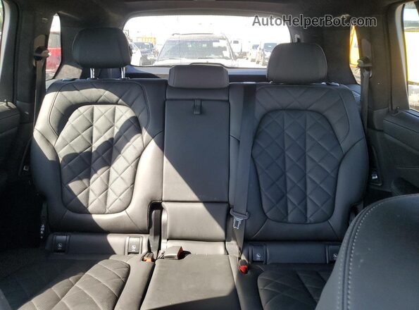 5UX23EM08S9W58217 2025 BMW X7 Черный Вид задних сидений