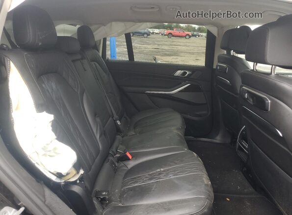 5UX23EM09P9R06580 2023 BMW X7 Charcoal Vista interior trasera