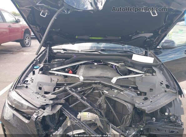5UX23EU04S9Y40478 2025 BMW X5 Blue Vista trasera