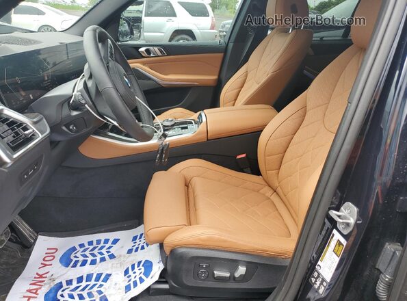 5UX23EU05S9Z25328 2025 BMW X5 Black Front interior view