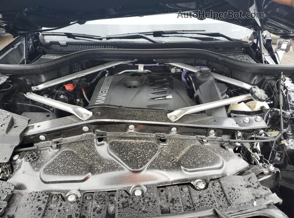 5UX23EU05S9Z25328 2025 BMW X5 Black Rear interior view
