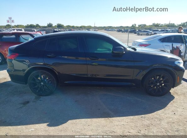 5UX2V1C04L9C56655 2020 BMW X4 Black Widok wnętrza z tyłu