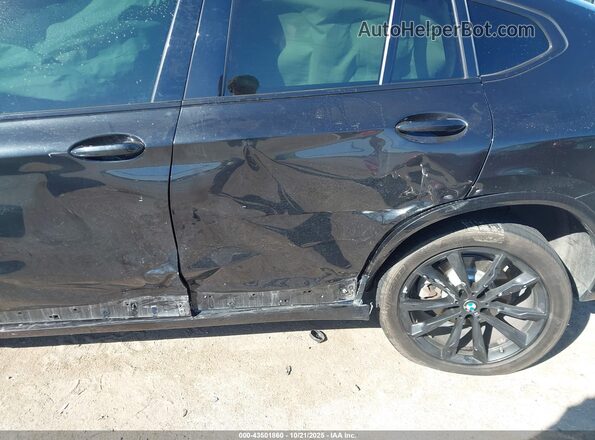 5UX2V1C04L9C56655 2020 BMW X4 Black Widok z przodu