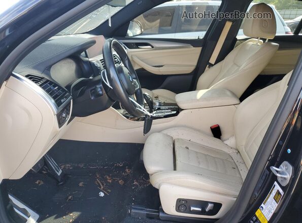 5UX2V5C08M9F46681 2021 BMW X4 Blue Widok wnętrza z przodu