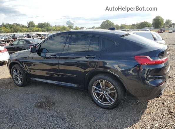 5UX2V5C08M9F46681 2021 BMW X4 Blue Tył lewy