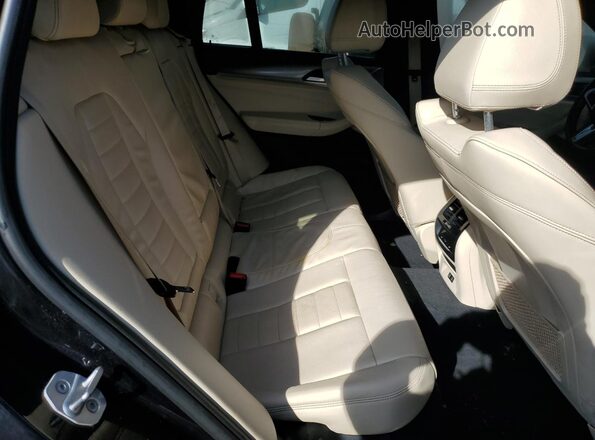 5UX2V5C08M9F46681 2021 BMW X4 Blue Widok wnętrza z tyłu