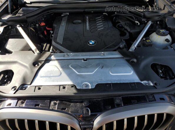 5UX2V5C08M9F46681 2021 BMW X4 Blue Widok komory silnika