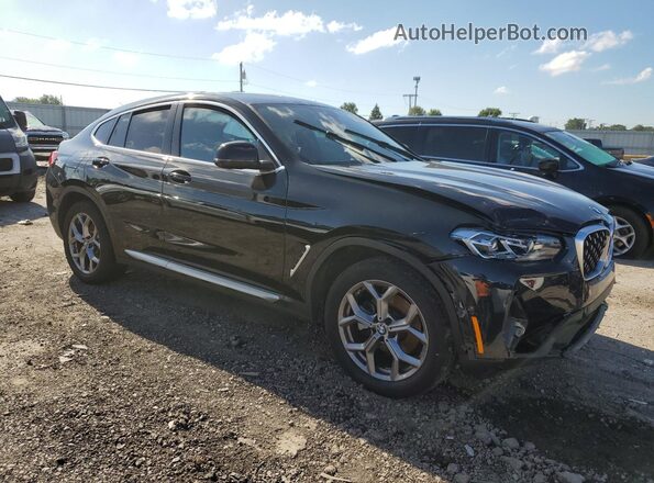 5UX33DT00R9U38452 2024 BMW X4 Черный Передняя правая четверть