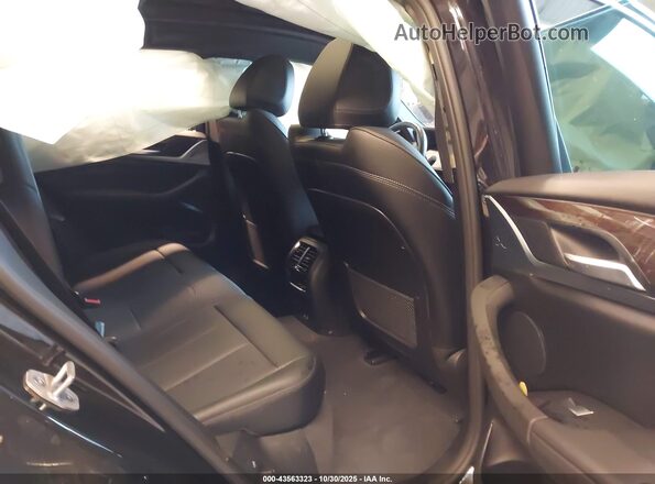 5UX33DT01R9V07584 2024 BMW X4 Black Widok naklejki z numerem VIN
