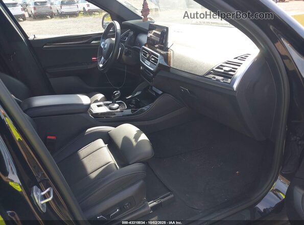 5UX33DT07R9V46499 2024 BMW X4 Black Widok wnętrza z przodu