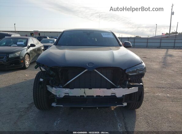 5UX33DT08S9084993 2025 BMW X4 Black Rear interior view