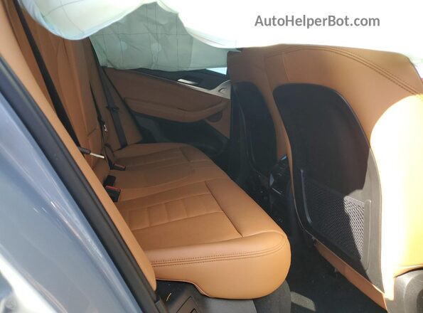5UX33DT0XR9X06293 2024 BMW X4 Silver Vista de los asientos traseros