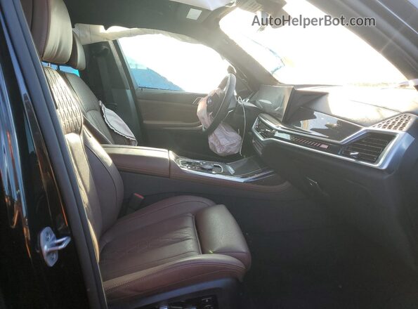 5UX33EM09T9018975 2026 BMW X7 Черный Вид салона спереди