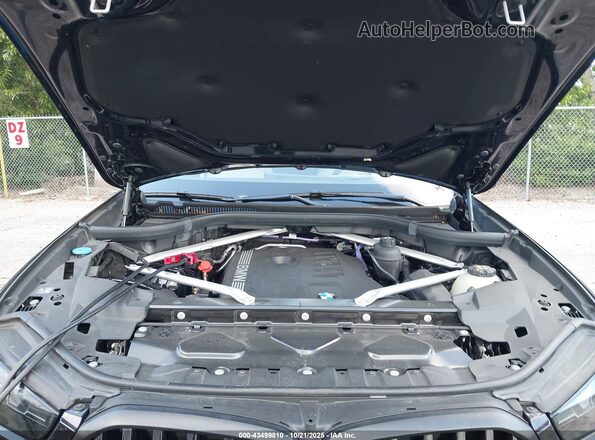 5UX33EX04R9V18045 2024 BMW X6 Black Rear view