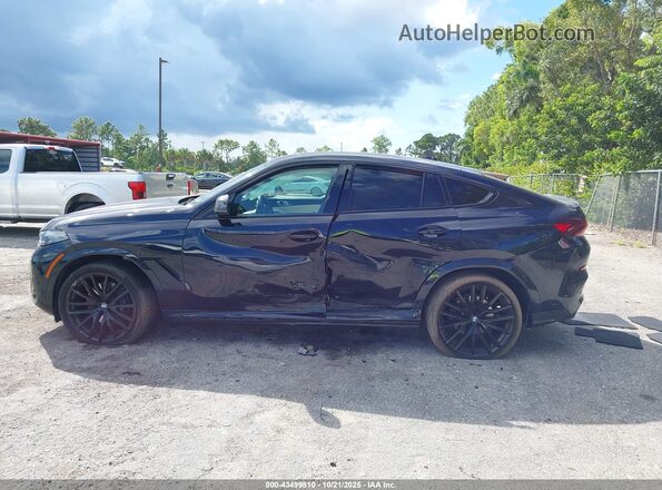 5UX33EX04R9V18045 2024 BMW X6 Black Rear interior view