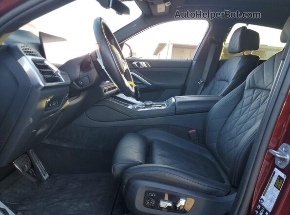5UX33EX07R9V41884 2024 BMW X6 Maroon Widok wnętrza z przodu