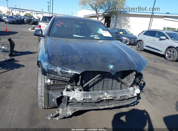 5UX33EX0XS9Y40842 2025 BMW X6 Черный Вид задней части салона