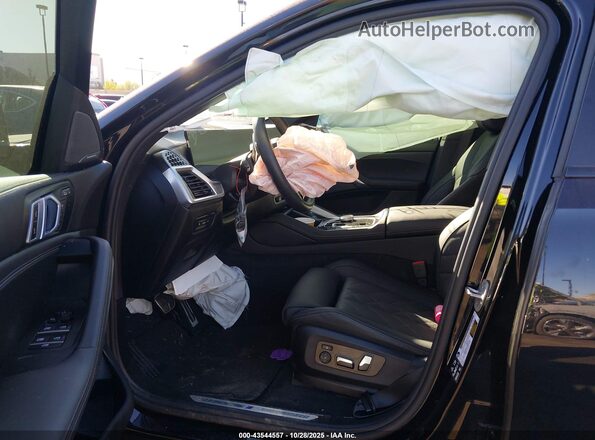 5UX33EX0XS9Y40842 2025 BMW X6 Черный Вид салона спереди