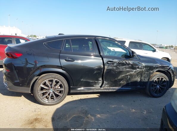 5UX33EX0XS9Z23333 2025 BMW X6 Black Vista interior trasera