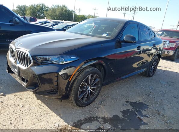 5UX33EX0XS9Z23333 2025 BMW X6 Black Vista tres cuartos delantera izquierda