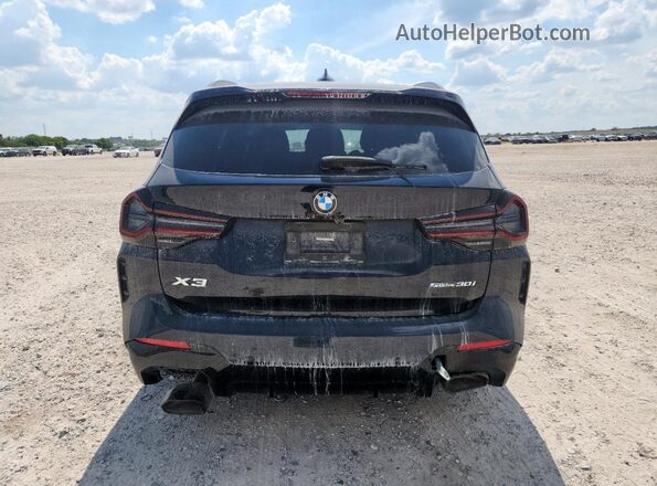 5UX43DP01P9P29585 2023 BMW X3 Blue Rear view