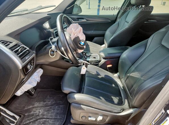 5UX43DP01P9P29585 2023 BMW X3 Blue Front interior view