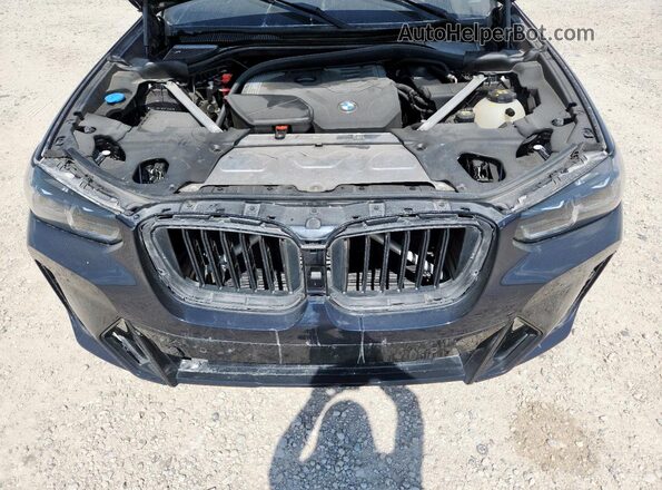 5UX43DP01P9P29585 2023 BMW X3 Blue Engine compartment view