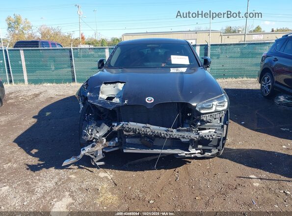 5UX43DT07P9P53525 2023 BMW X4 Black Vista interior trasera