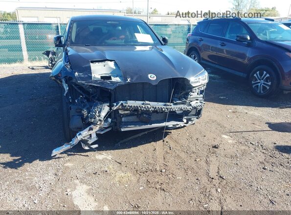 5UX43DT07P9P53525 2023 BMW X4 Black Vista frontal