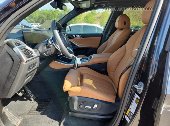 5UX43EU08S9Z09729 2025 BMW X5 Blue Front interior view
