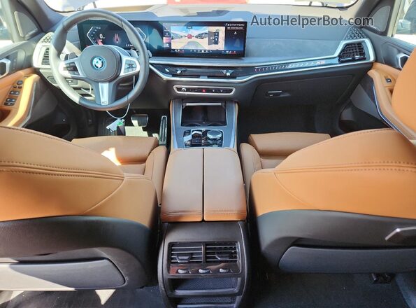 5UX43EU08S9Z09729 2025 BMW X5 Blue Dashboard view