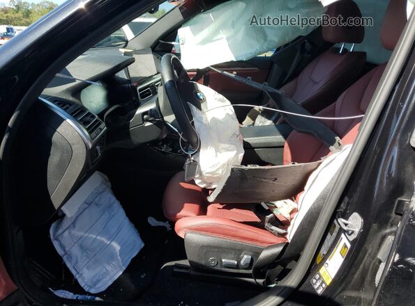 5UX53DP01R9T55809 2024 BMW X3 Black Вид салону спереду