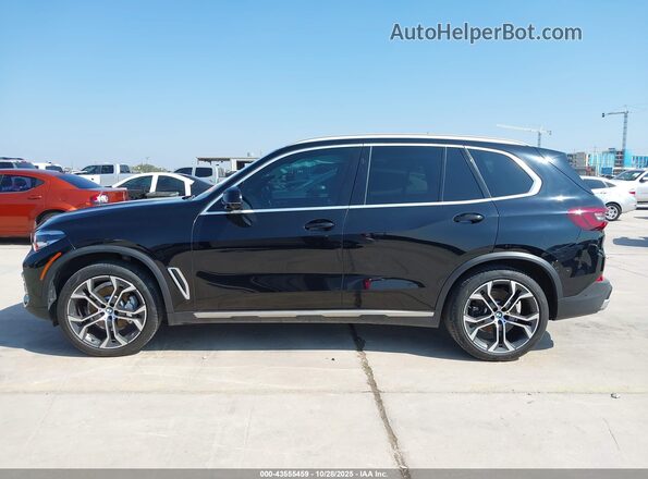 5UXCR4C08P9P71705 2023 BMW X5 Black Вид задньої частини салону