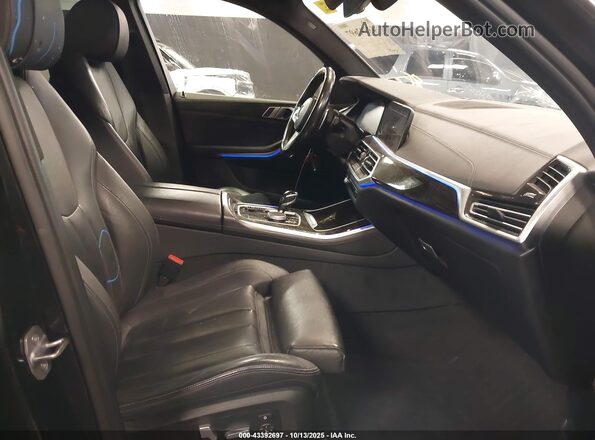 5UXCR6C01LLL66388 2020 BMW X5 Black Front interior view