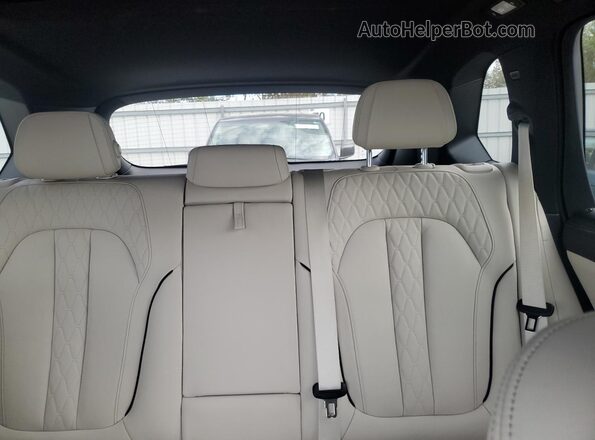5UXCR6C01M9E76245 2021 BMW X5 Black Rear seats view