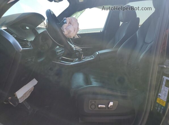 5UXCR6C0XM9E55376 2021 BMW X5 Black Front interior view