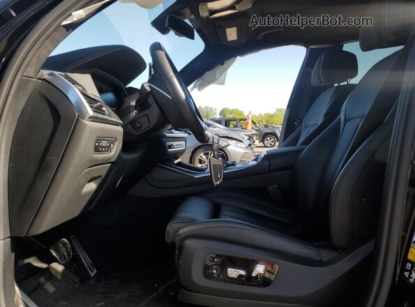 5UXCW2C02N9M89814 2022 BMW X7 Black Vista interior delantera