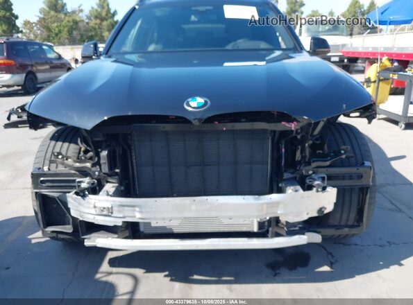 5UXCW2C03N9N11500 2022 BMW X7 Black Вид задньої частини салону