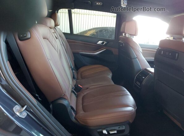 5UXCW2C04L9C57487 2020 BMW X7 Charcoal Vista interior trasera