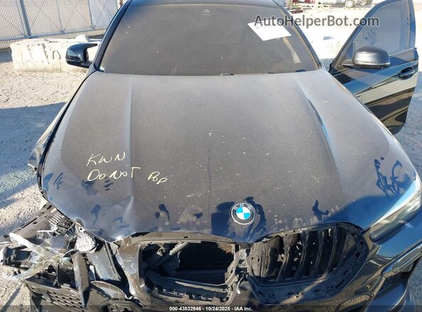 5UXCY4C00L9C49425 2020 BMW X6 Черный Вид сзади
