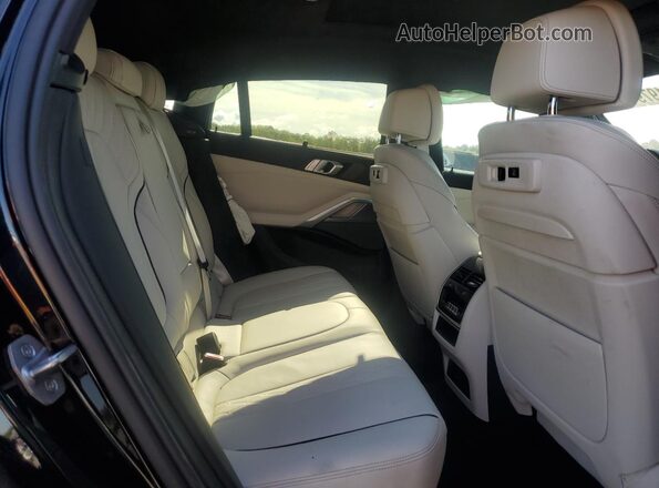 5UXCY8C07P9N45178 2023 BMW X6 Blue Widok wnętrza z tyłu