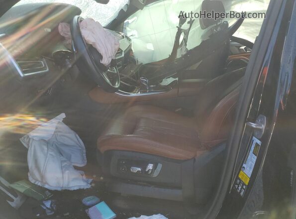5UXJU4C08P9P89935 2023 BMW X5 Black Vista interior delantera