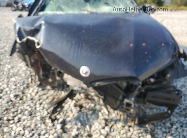 5UXJU4C08P9P89935 2023 BMW X5 Black Vista del compartimento del motor