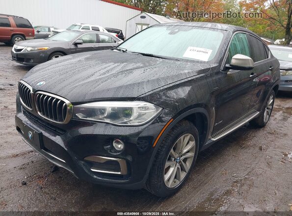 5UXKU2C57J0Z61369 2018 BMW X6 Black Առջևի ձախ երեք քառորդ տեսարան