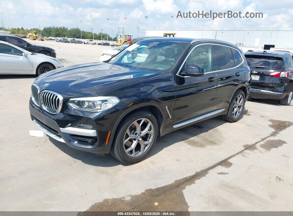 5UXTY3C07M9F04910 2021 BMW X3 Black Առջևի ձախ երեք քառորդ տեսարան