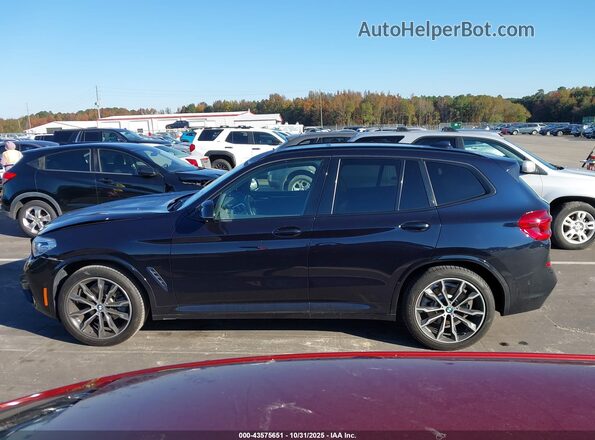 5UXTY3C08L9B77304 2020 BMW X3 Dark Blue Вид задньої частини салону