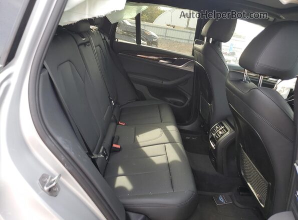 5UXTY5C02L9D44526 2020 BMW X3 Silver Սալոնի հետևի տեսք