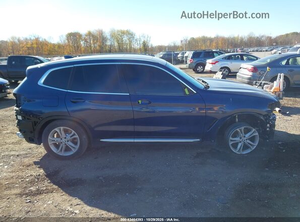 5UXTY5C03L9B37174 2020 BMW X3 Blue Vista interior trasera