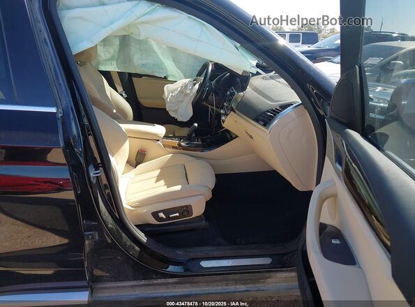 5UXTY5C03L9D45975 2020 BMW X3 Black Widok wnętrza z przodu
